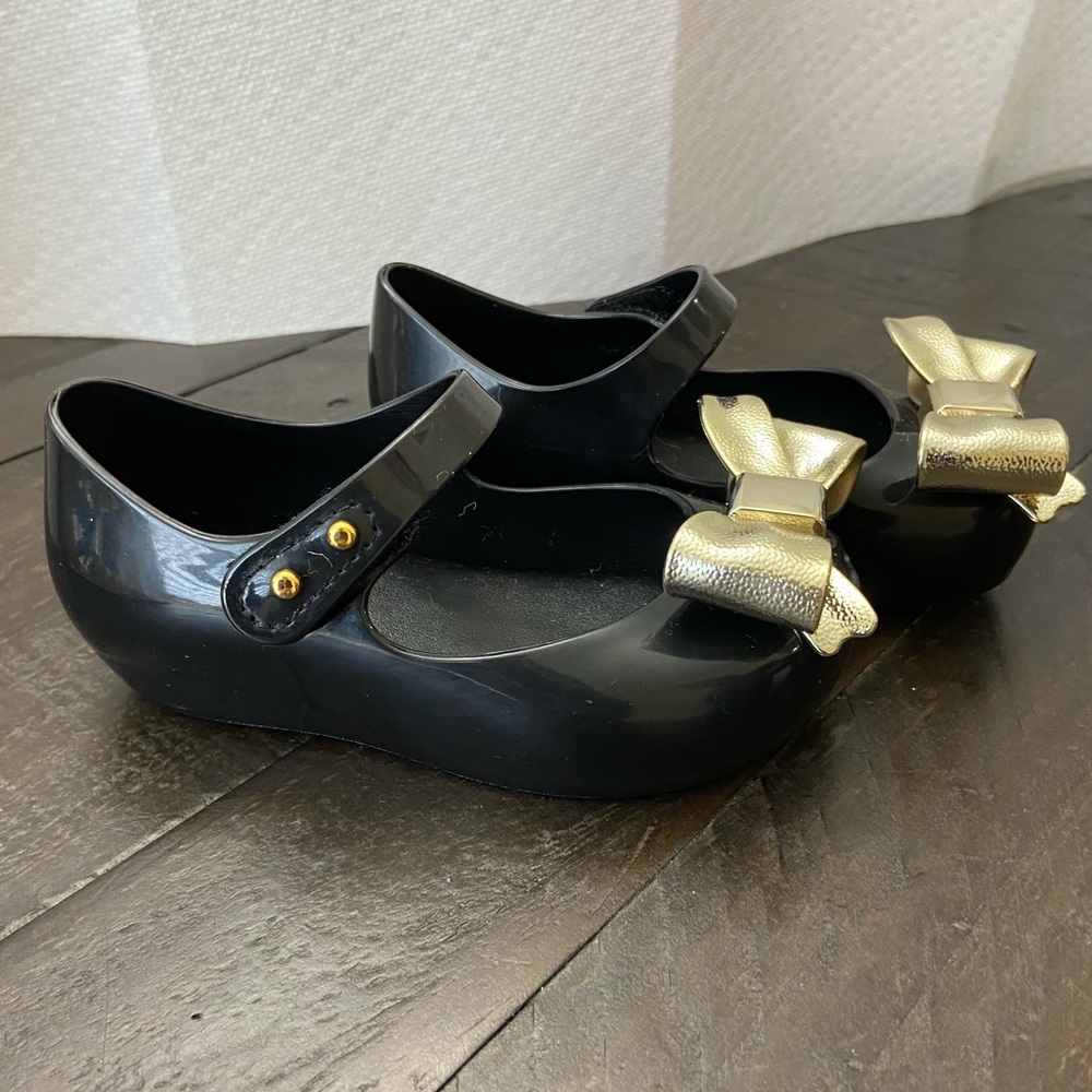 Mini Melissa - black shoes with golden bow - Picture 2 of 3